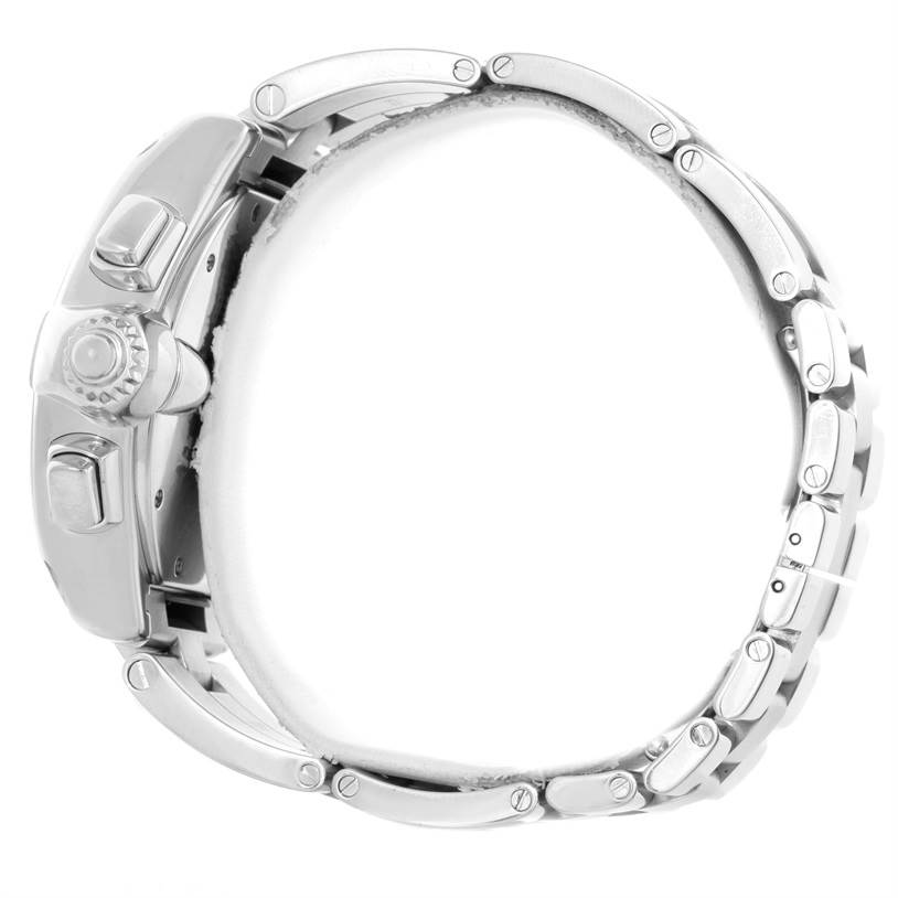 This side-angle view of the Cartier Roadster W62019X6 Men's Stainless Steel Silver Dial W62019X6 Men's Stainless Steel Silver Dial watch shows its crown, pushers, and a portion of the metal bracelet.