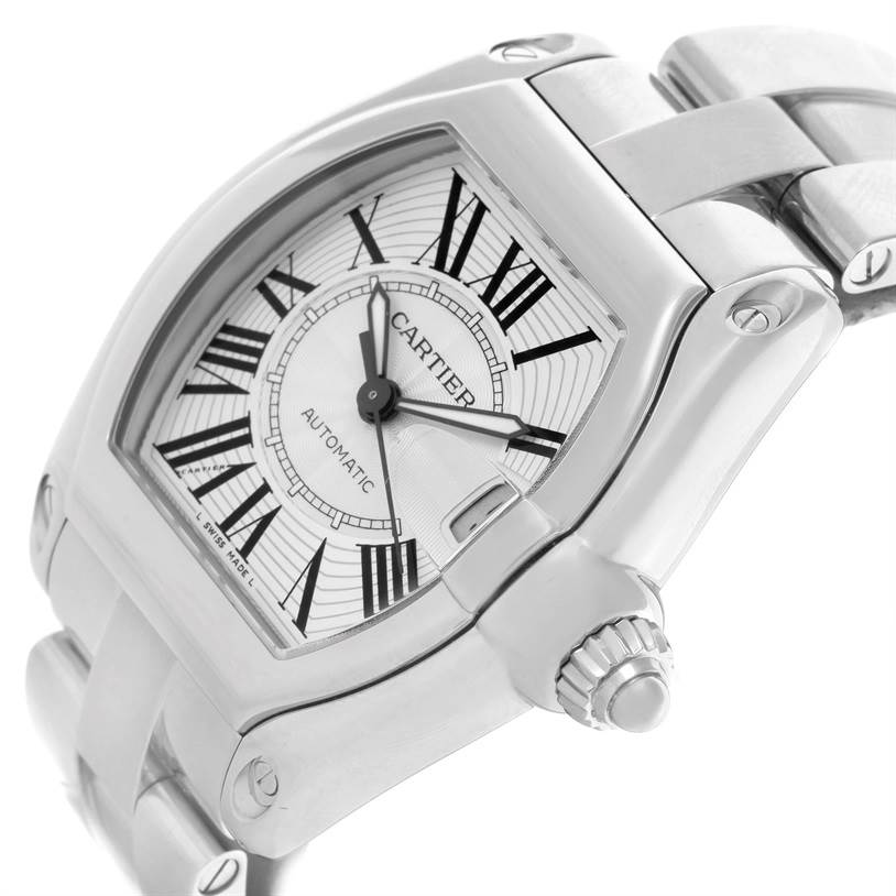 The image shows a close-up angle of the Cartier Roadster W62025V3 Men's Stainless Steel Silver Dial W62025V3 Men's Stainless Steel Silver Dial watch, highlighting the face, bezel, and part of the bracelet.