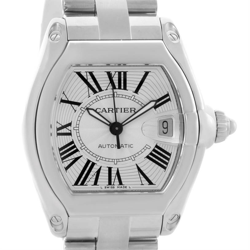 The image shows a frontal view of a Cartier Roadster W62025V3 Men's Stainless Steel Silver Dial W62025V3 Men's Stainless Steel Silver Dial watch, displaying the dial, hands, date window, and part of the bracelet.