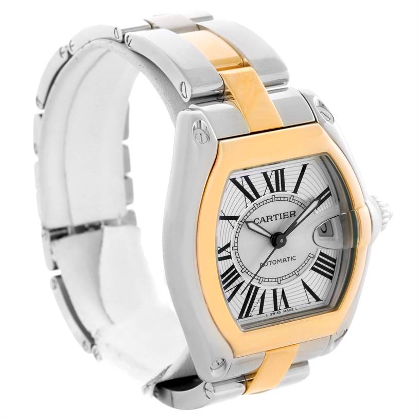 The photo shows a Cartier Roadster W62031Y4 Men's Steel and Gold (two tone) Silver Dial W62031Y4 Men's Steel and Gold (two tone) Silver Dial watch at a three-quarter view angle, highlighting the face, bezel, and bracelet.