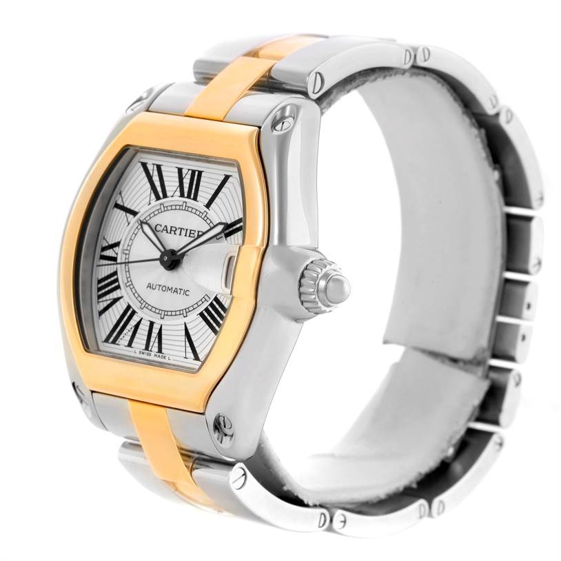 The Cartier Roadster W62031Y4 Men's Steel and Gold (two tone) Silver Dial W62031Y4 Men's Steel and Gold (two tone) Silver Dial watch is shown in a three-quarter angle, highlighting the dial, bezel, crown, and part of the strap.
