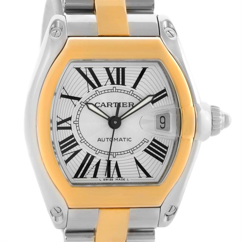 The image shows a front view of the Cartier Roadster W62031Y4 Men's Steel and Gold (two tone) Silver Dial W62031Y4 Men's Steel and Gold (two tone) Silver Dial watch, highlighting its dial, bezel, and part of the bracelet.