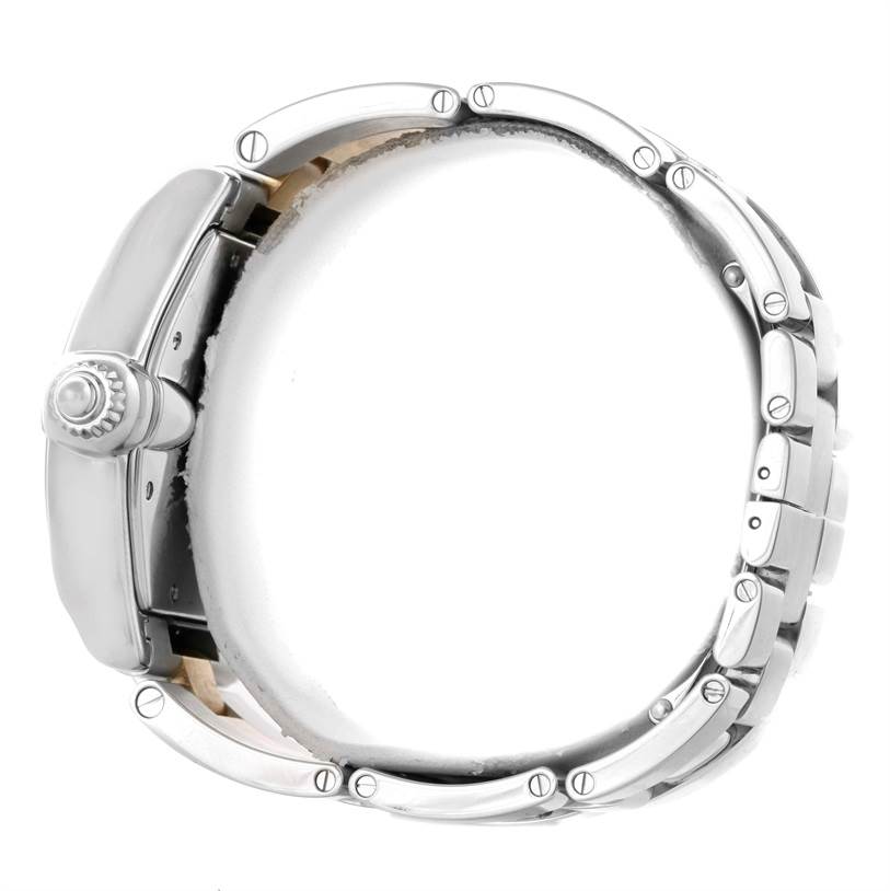 The image shows a Cartier Roadster W62031Y4 Men's Steel and Gold (two tone) Silver Dial W62031Y4 Men's Steel and Gold (two tone) Silver Dial watch from a side angle, highlighting the crown and part of the metal bracelet.