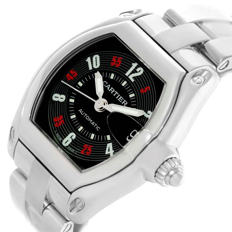 The image shows a close-up of a Cartier Roadster W62002V3 Men's Stainless Steel Black Dial W62002V3 Men's Stainless Steel Black Dial watch, viewed at an angle highlighting the face, crown, and part of the metal bracelet.