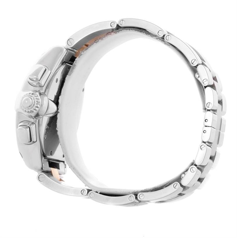 The image shows a side view of the Cartier Roadster W62027Z1 Men's Steel and Gold (two tone) Silver Dial W62027Z1 Men's Steel and Gold (two tone) Silver Dial watch, highlighting its case, crown, and bracelet.