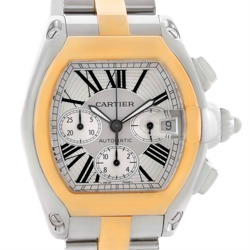 The Cartier Roadster W62027Z1 Men's Steel and Gold (two tone) Silver Dial W62027Z1 Men's Steel and Gold (two tone) Silver Dial watch is shown from the front, highlighting its dial, Roman numerals, subdials, and bracelet.