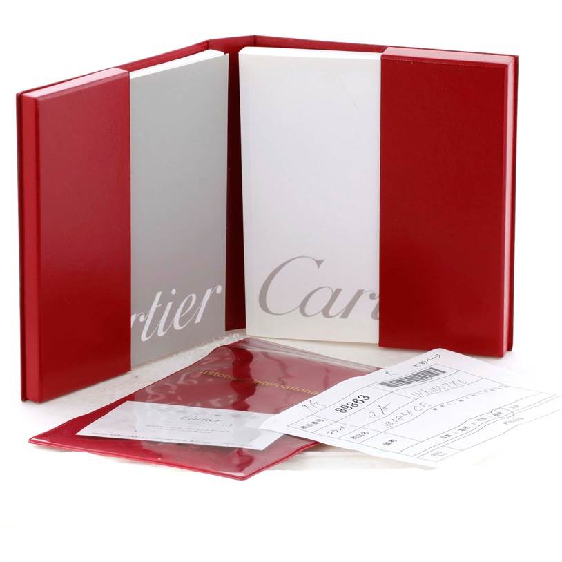 The image shows the packaging and documentation for the Cartier Roadster W62007X6 Men's Stainless Steel Black Dial W62007X6 Men's Stainless Steel Black Dial watch.