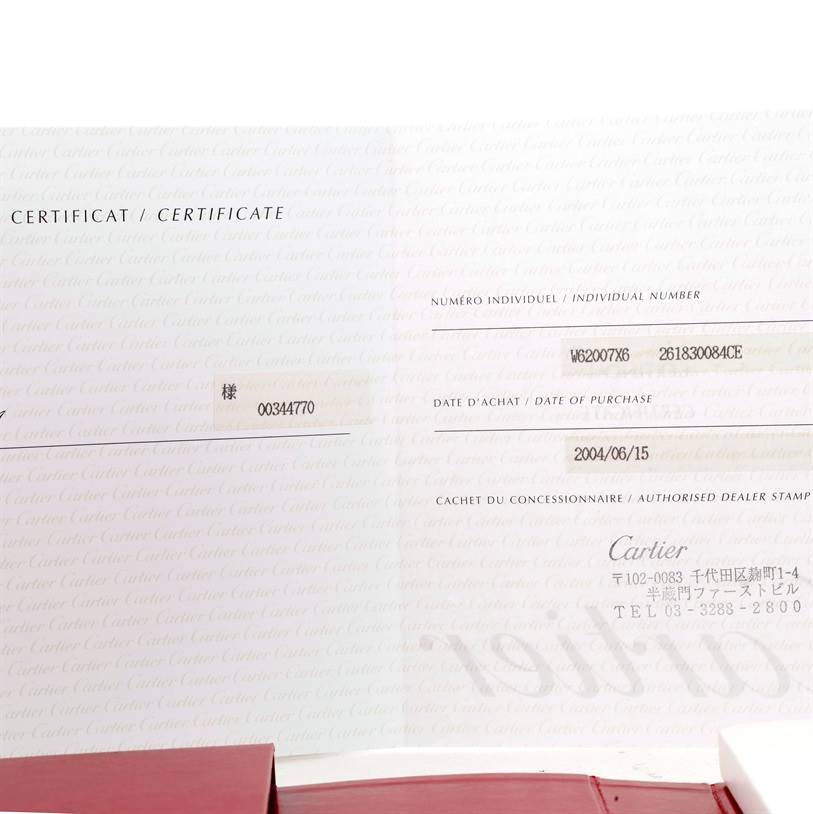 The image shows a Cartier certificate for a Roadster model, featuring the individual number, date of purchase, and dealer stamp.