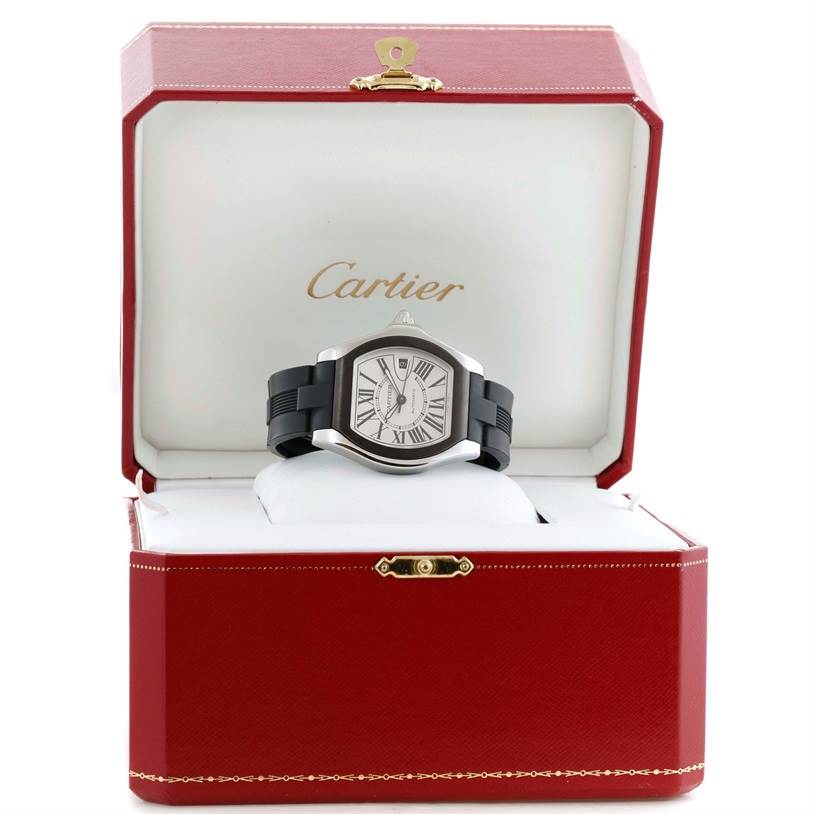 The image shows a Cartier Roadster W6206018 Men's Stainless Steel Silver Dial W6206018 Men's Stainless Steel Silver Dial watch with a black band displayed inside an open red Cartier box.