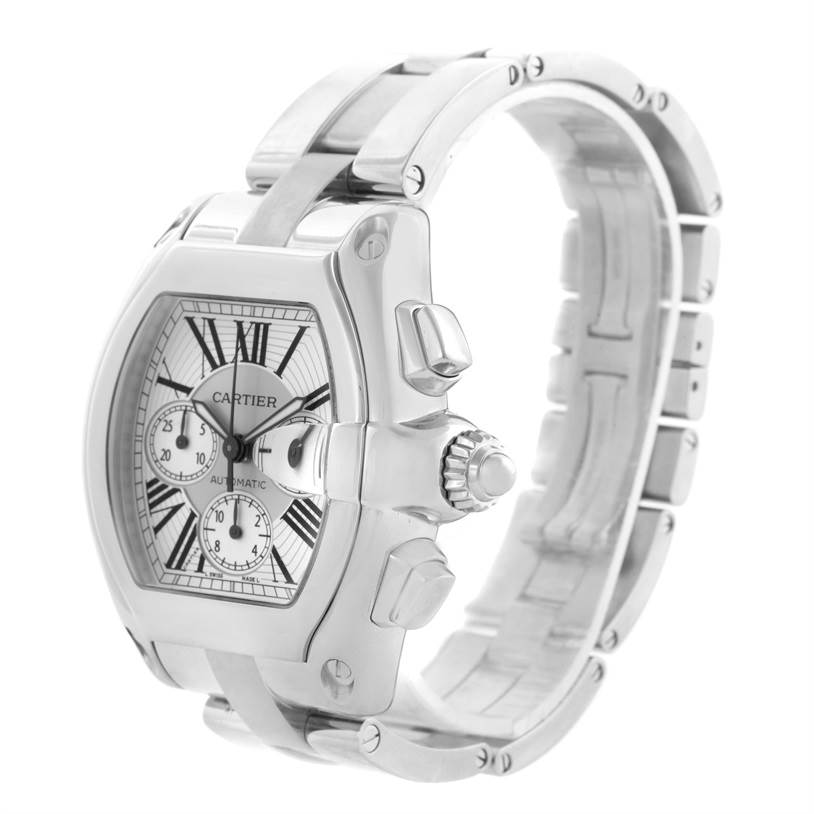 The image shows a side angle of the Cartier Roadster W62019X6 Men's Stainless Steel Silver Dial W62019X6 Men's Stainless Steel Silver Dial watch, highlighting the crown, pushers, case, and part of the bracelet.