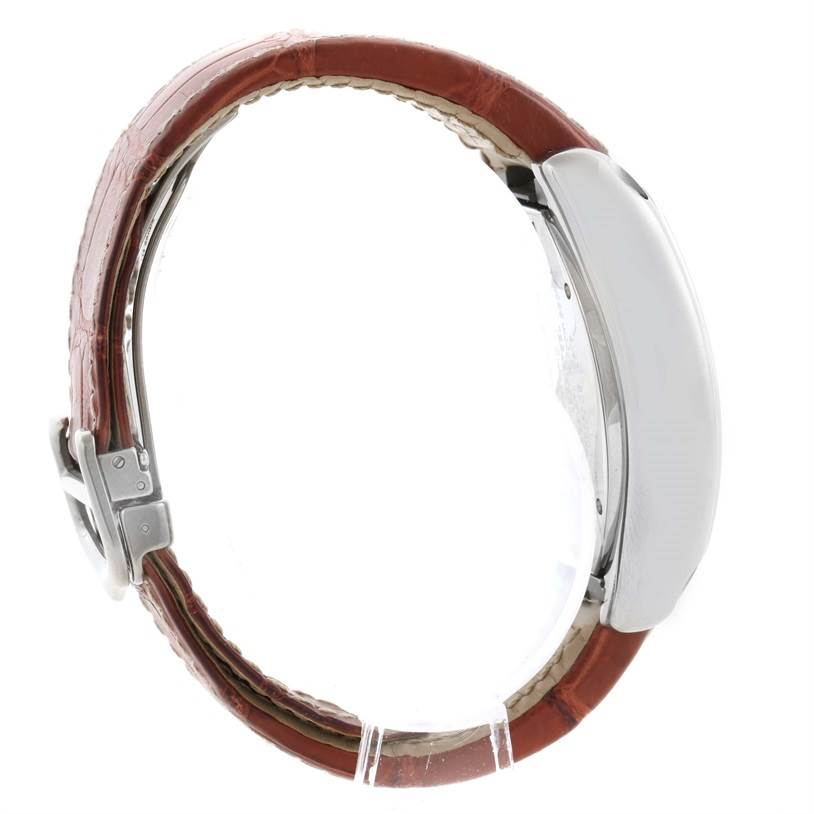 The image shows a side profile view of a Cartier Roadster W62019X6 Men's Stainless Steel Silver Dial W62019X6 Men's Stainless Steel Silver Dial watch displaying its case and leather strap.