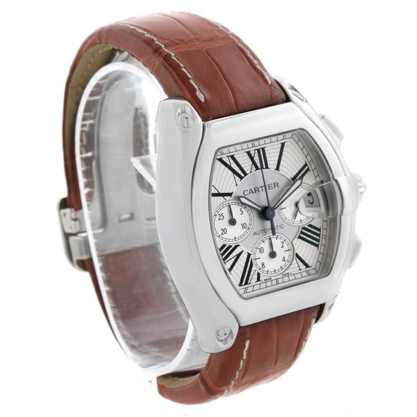 This image shows a Cartier Roadster W62019X6 Men's Stainless Steel Silver Dial W62019X6 Men's Stainless Steel Silver Dial watch from a front angle, highlighting its brown leather strap and silver dial.