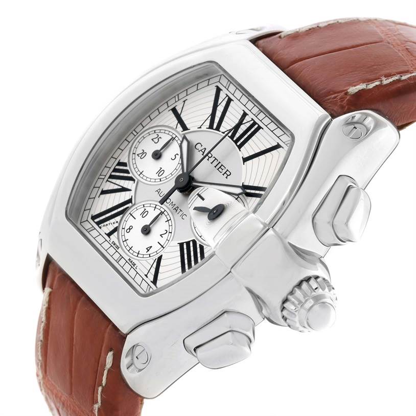 The image shows a close-up angle of the Cartier Roadster W62019X6 Men's Stainless Steel Silver Dial W62019X6 Men's Stainless Steel Silver Dial watch, highlighting the dial, crown, pushers, and leather strap.