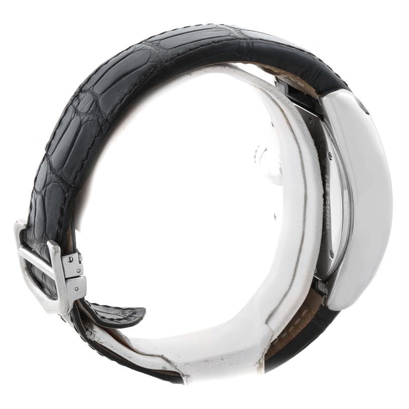 The image shows a side angle of a Cartier Roadster W62020X6 Men's Stainless Steel Black Dial W62020X6 Men's Stainless Steel Black Dial watch highlighting its black leather strap and buckle.