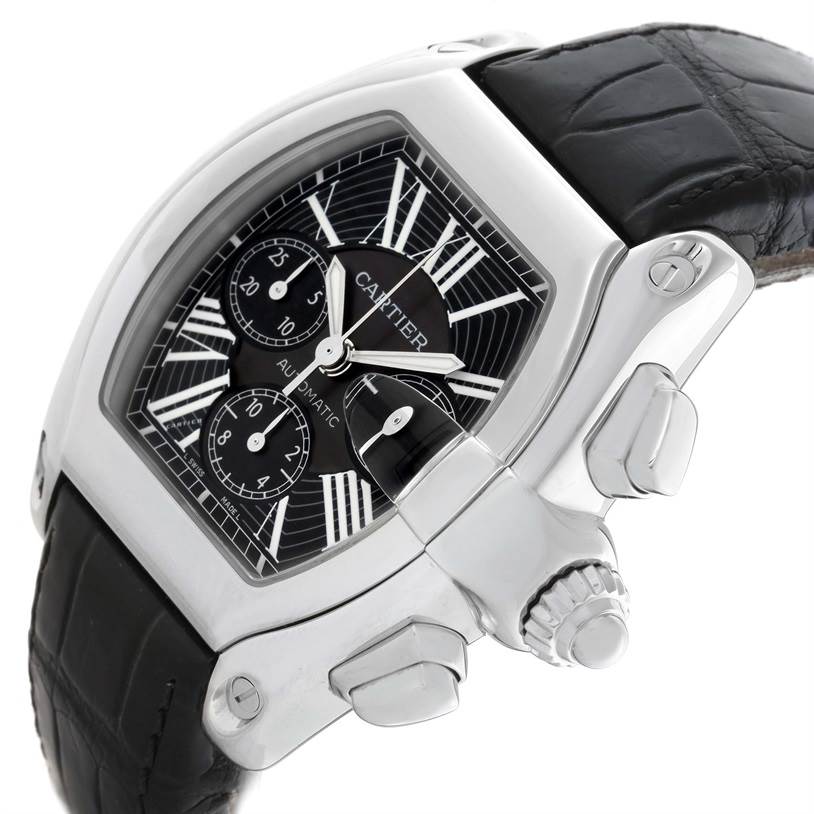 This is a close-up angle of the Cartier Roadster W62020X6 Men's Stainless Steel Black Dial W62020X6 Men's Stainless Steel Black Dial watch showing the dial, crown, and part of the black leather strap.