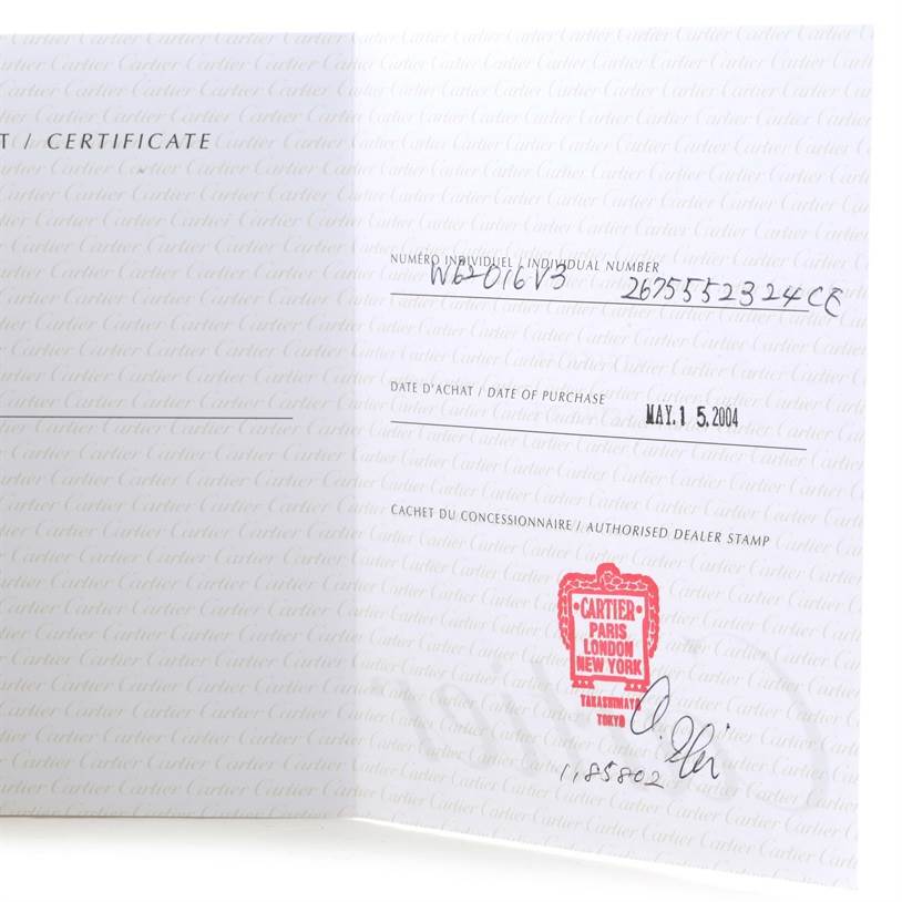 The image shows a certificate of authenticity for a Cartier Roadster W62019X6 Men's Stainless Steel Silver Dial W62019X6 Men's Stainless Steel Silver Dial watch, featuring purchase date, individual number, and dealer stamp.