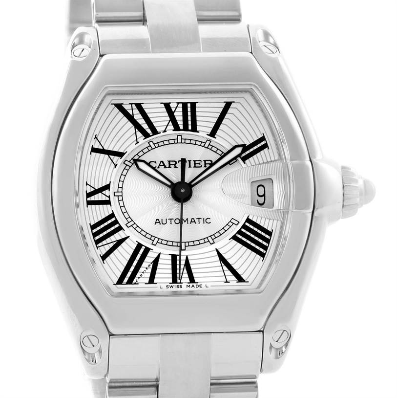 The image shows a front view of the Cartier Roadster W62025V3 Men's Stainless Steel Silver Dial W62025V3 Men's Stainless Steel Silver Dial watch, highlighting its face, Roman numerals, and date window.