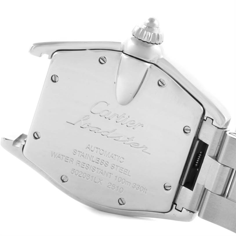 This image shows the back case and part of the bracelet of a Cartier Roadster W62025V3 Men's Stainless Steel Silver Dial W62025V3 Men's Stainless Steel Silver Dial watch at an angled view.
