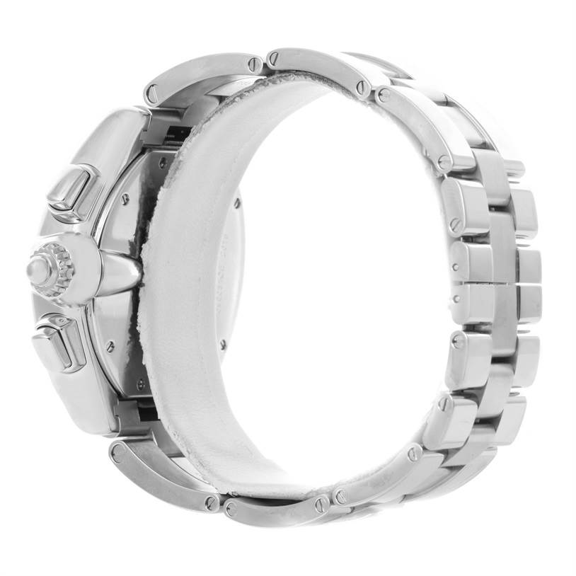 The image shows a side view of the Cartier Roadster W62019X6 Men's Stainless Steel Silver Dial W62019X6 Men's Stainless Steel Silver Dial watch, focusing on the crown, push buttons, and metallic bracelet.