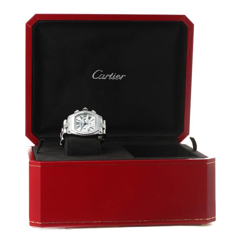 The Cartier Roadster W62019X6 Men's Stainless Steel Silver Dial W62019X6 Men's Stainless Steel Silver Dial watch is displayed inside its red box with open lid, showing the watch face and bracelet.