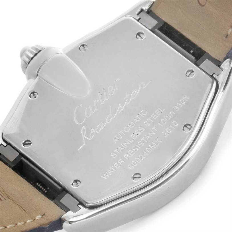 The image shows a close-up view of the stainless steel case back of a Cartier Roadster W62048V3 Men's Stainless Steel Blue Dial W62048V3 Men's Stainless Steel Blue Dial watch, including its engravings and strap attachment.