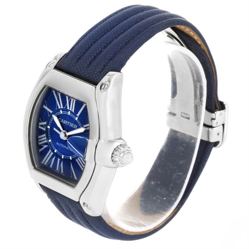 The Cartier Roadster W62048V3 Men's Stainless Steel Blue Dial W62048V3 Men's Stainless Steel Blue Dial watch is shown at a three-quarter angle, highlighting the face, bezel, crown, and part of the strap.