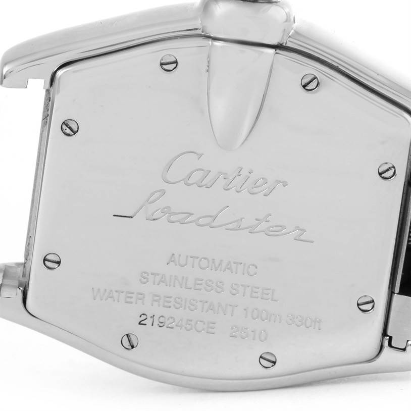 The image shows the back case of the Cartier Roadster W62025V3 Men
s Stainless Steel Silver Dial W62025V3 Men
s Stainless Steel Silver Dial watch, with engravings and screws visible.