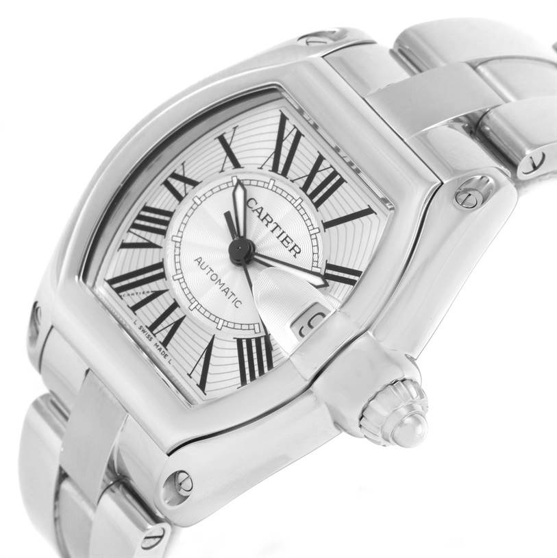 The image shows a close-up angle of the Cartier Roadster W62025V3 Men
s Stainless Steel Silver Dial W62025V3 Men
s Stainless Steel Silver Dial watch, highlighting the face, bezel, crown, and part of the bracelet.
