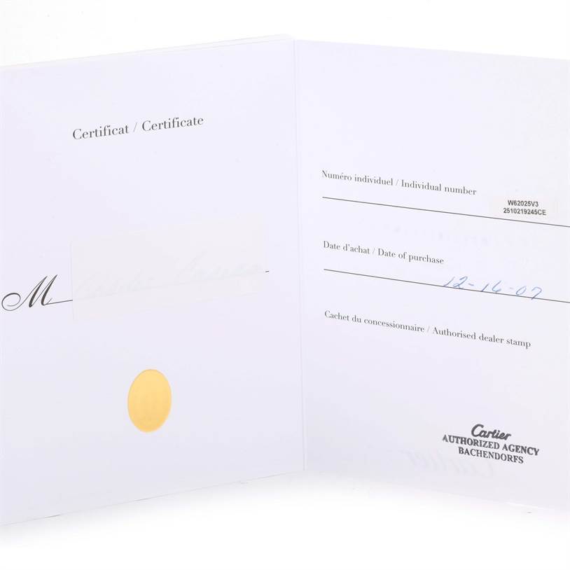 The image shows an open certificate booklet for the Cartier Roadster W62025V3 Men
s Stainless Steel Silver Dial W62025V3 Men
s Stainless Steel Silver Dial model watch, displaying individual number and purchase date.