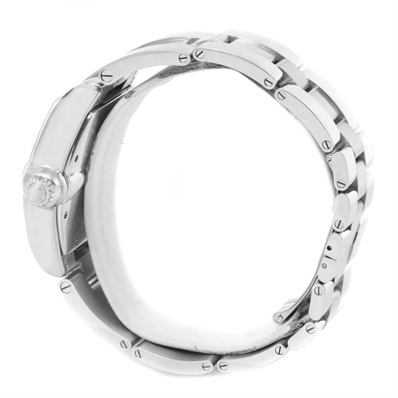 The image shows the side view of a Cartier Roadster W62025V3 Men
s Stainless Steel Silver Dial W62025V3 Men
s Stainless Steel Silver Dial watch, highlighting its metallic case and bracelet.