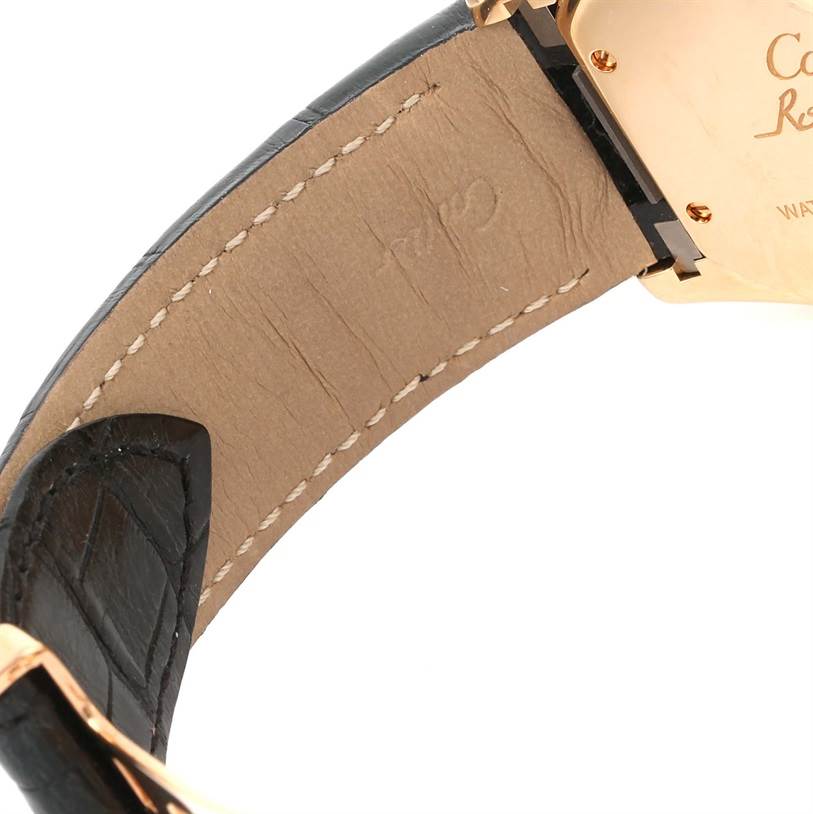 This image shows a close-up, angled view of the leather strap and back of the Cartier Roadster W62021Y2 Men's Yellow Gold Silver Dial W62021Y2 Men's Yellow Gold Silver Dial watch.