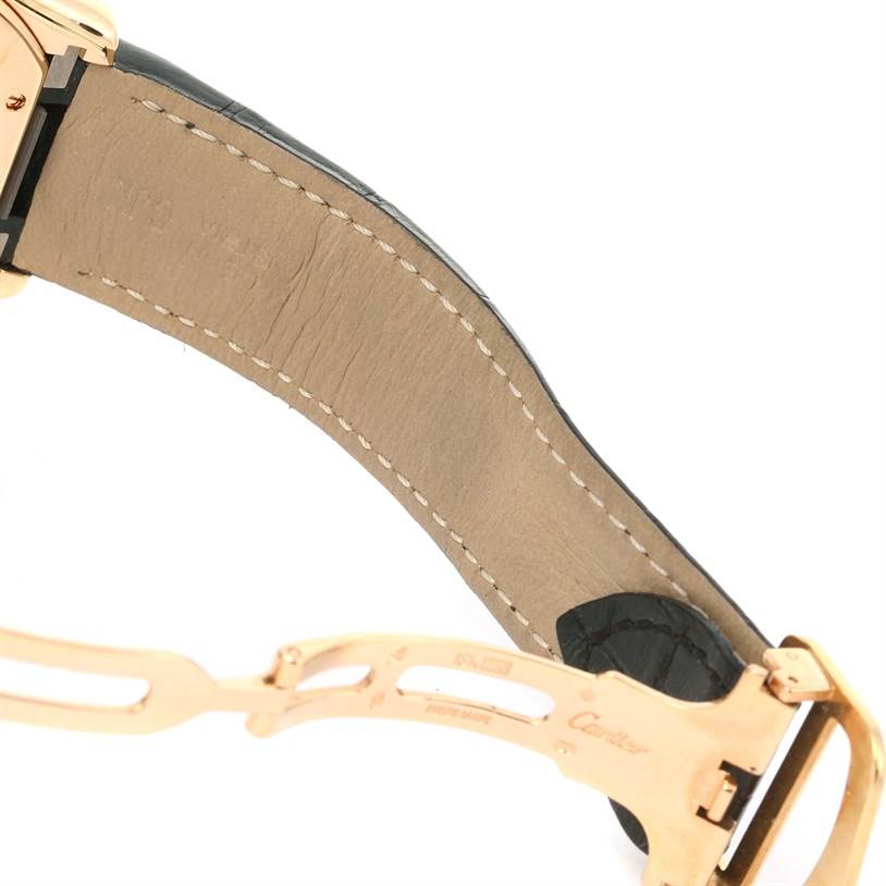 This image shows the underside of the leather strap and clasp mechanism of the Cartier Roadster W62021Y2 Men's Yellow Gold Silver Dial W62021Y2 Men's Yellow Gold Silver Dial watch.