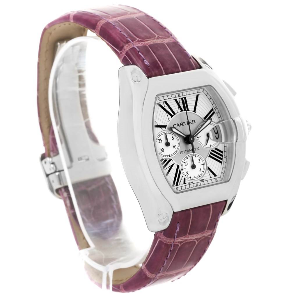 The Cartier Roadster W62019X6 Men's Stainless Steel Silver Dial W62019X6 Men's Stainless Steel Silver Dial watch is shown at a three-quarter angle highlighting the dial and the purple leather strap.