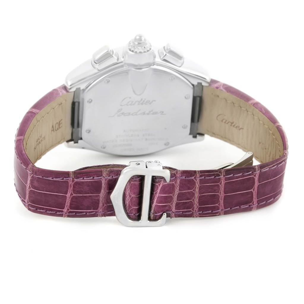 The image shows the back view of a Cartier Roadster W62019X6 Men's Stainless Steel Silver Dial W62019X6 Men's Stainless Steel Silver Dial watch, highlighting the case back, lugs, and purple leather strap with a buckle.