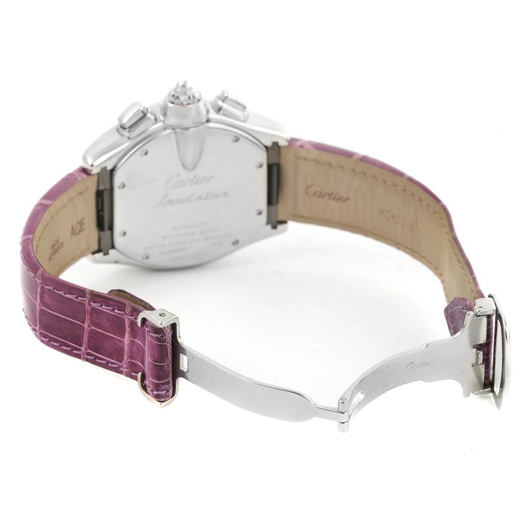 This image shows the back of the Cartier Roadster W62019X6 Men's Stainless Steel Silver Dial W62019X6 Men's Stainless Steel Silver Dial watch, highlighting its case back, crown, and purple leather strap.