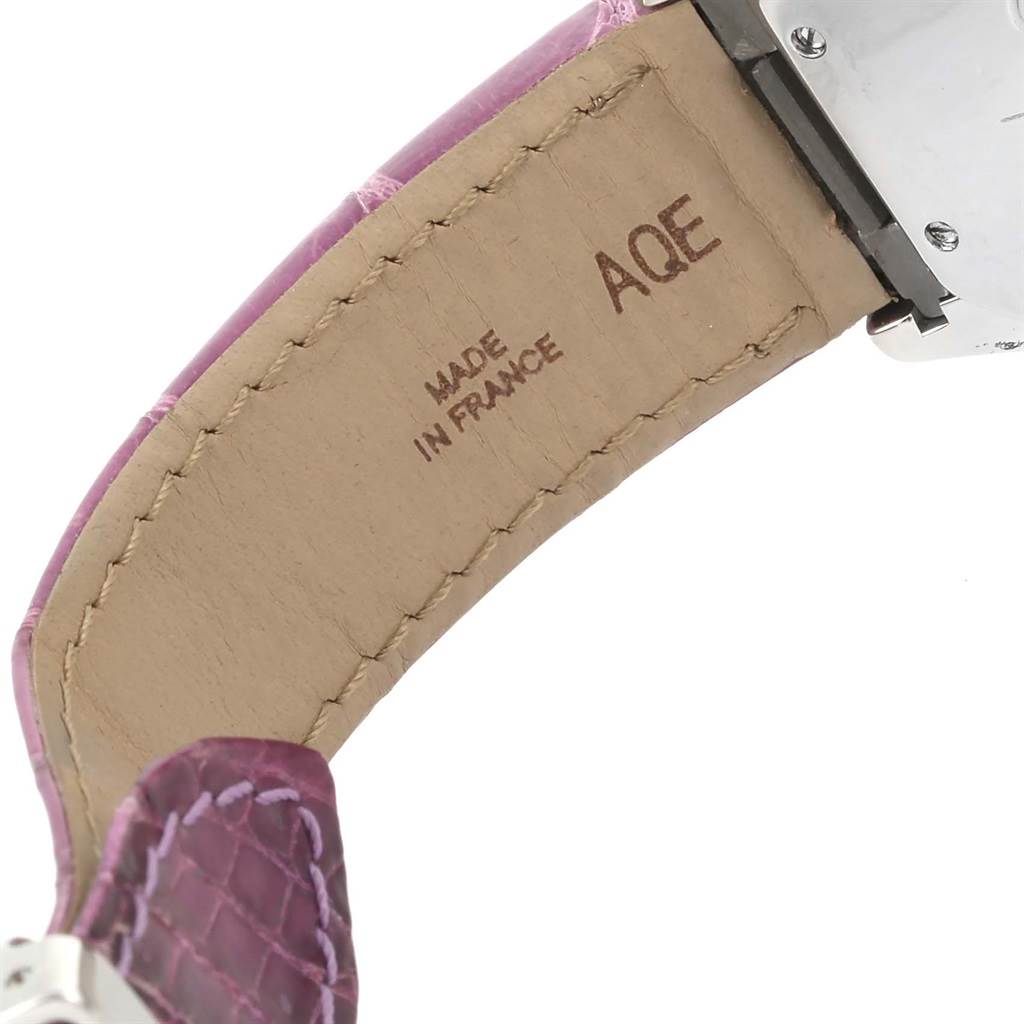This image shows the inside of a pink leather strap for a Cartier Roadster W62019X6 Men's Stainless Steel Silver Dial W62019X6 Men's Stainless Steel Silver Dial watch, stamped "Made in France" and "AQE".