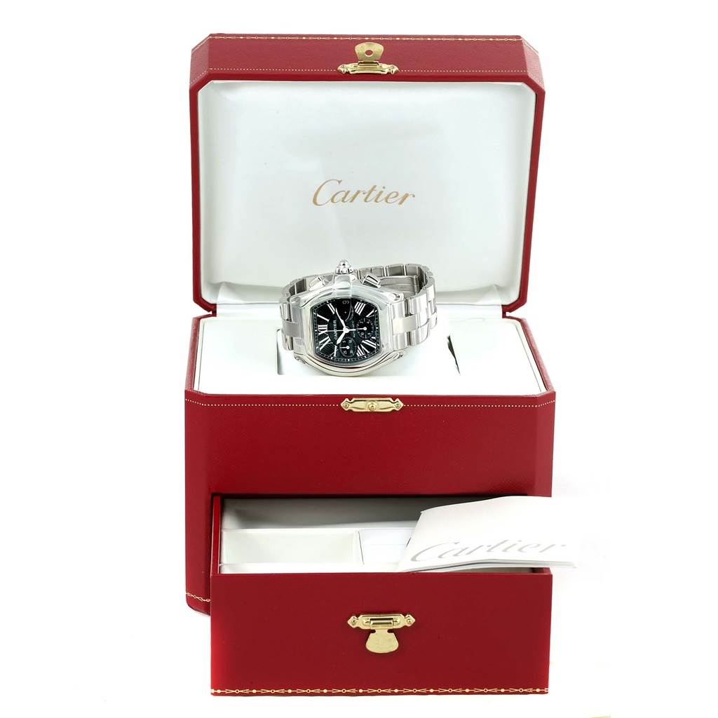 The Cartier Roadster W62020X6 Men's Stainless Steel Black Dial W62020X6 Men's Stainless Steel Black Dial watch is shown in its open red box, highlighting the front view and its bracelet.