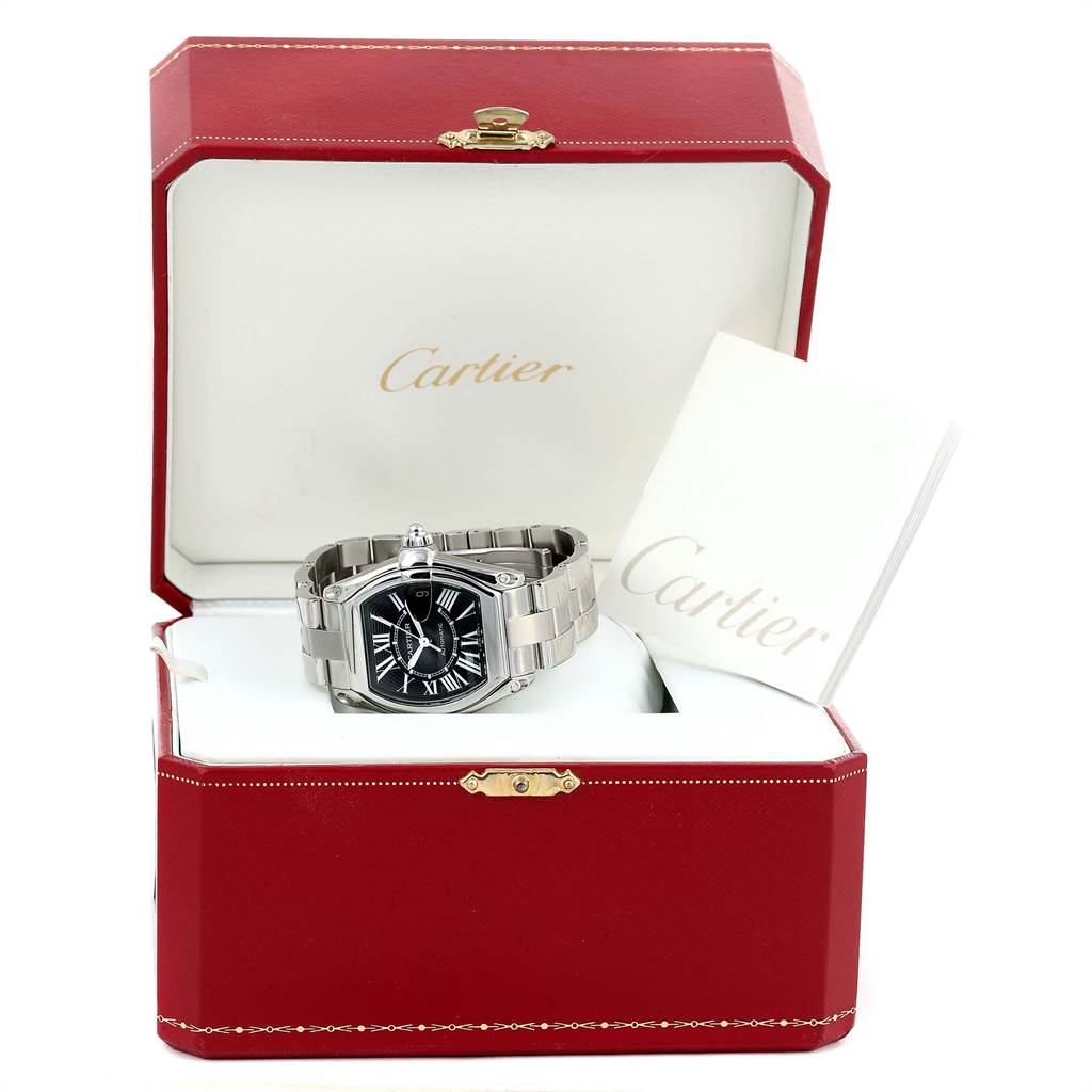 The Cartier Roadster W62041V3 Men's Stainless Steel Black Dial W62041V3 Men's Stainless Steel Black Dial watch is shown in its red box from a front angle, alongside a booklet.