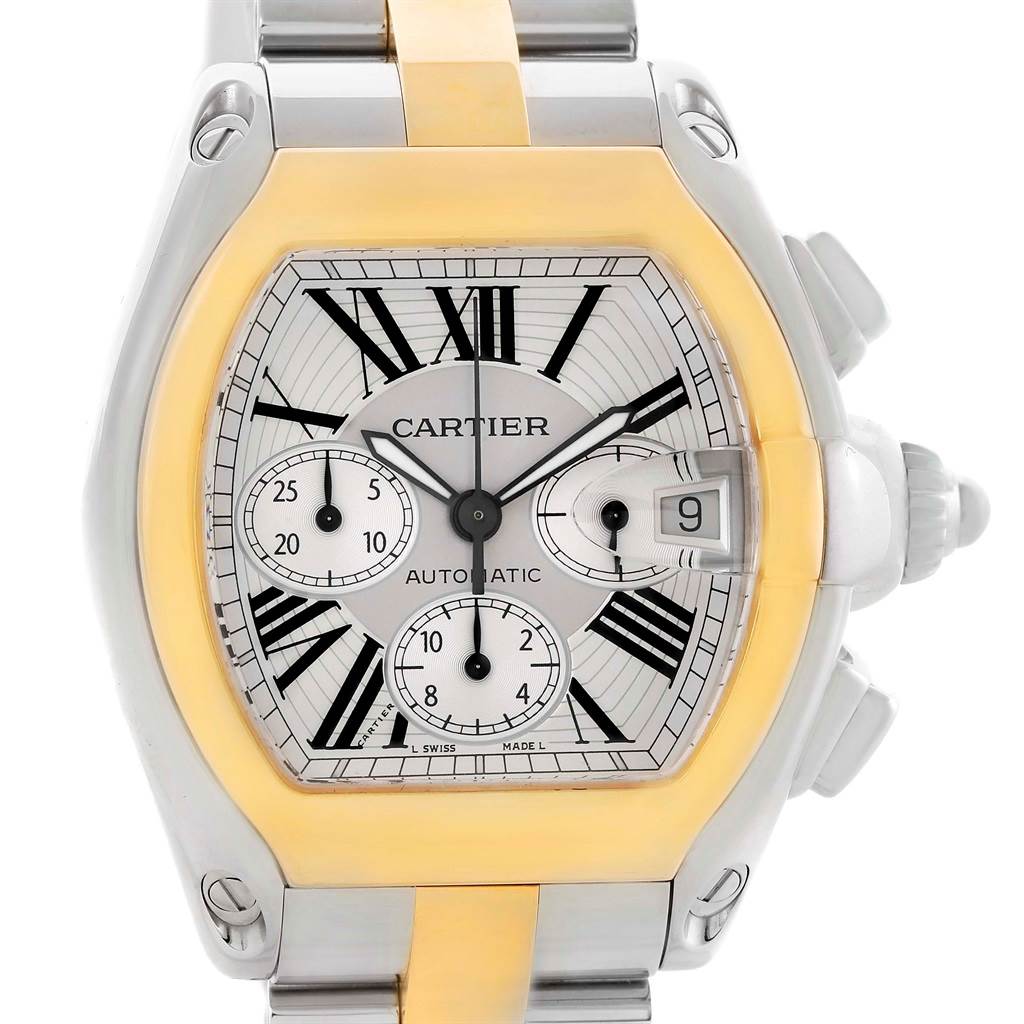 The Cartier Roadster W62027Z1 Men's Steel and Gold (two tone) Silver Dial W62027Z1 Men's Steel and Gold (two tone) Silver Dial watch is shown from a front angle, displaying its face, bezel, and parts of the bracelet.