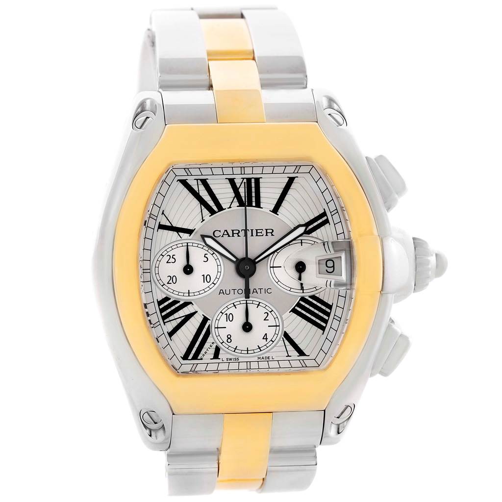 The image shows a frontal view of the Cartier Roadster W62027Z1 Men's Steel and Gold (two tone) Silver Dial W62027Z1 Men's Steel and Gold (two tone) Silver Dial watch, highlighting its dial, hands, subdials, and bracelet.