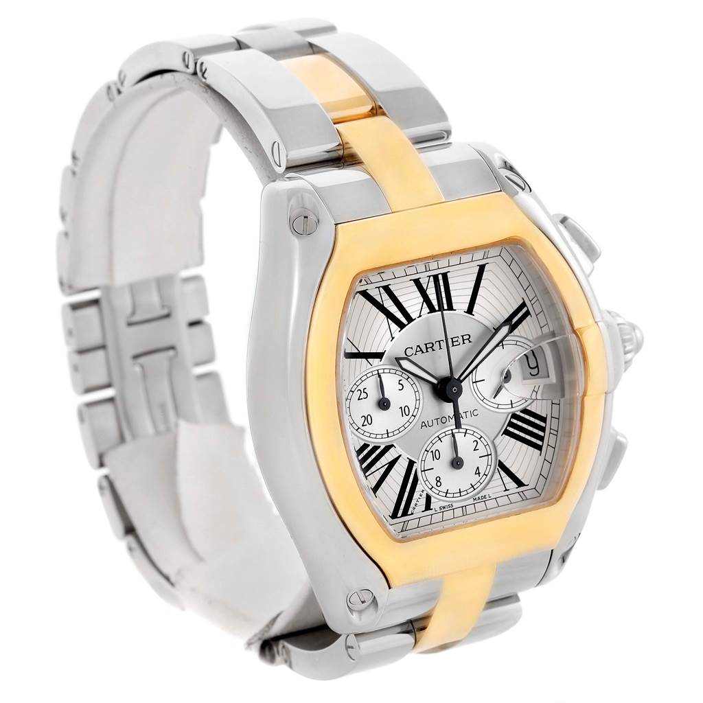 The Cartier Roadster W62027Z1 Men's Steel and Gold (two tone) Silver Dial W62027Z1 Men's Steel and Gold (two tone) Silver Dial watch is shown at a three-quarter angle, displaying its case, bezel, bracelet, dial, and crown.