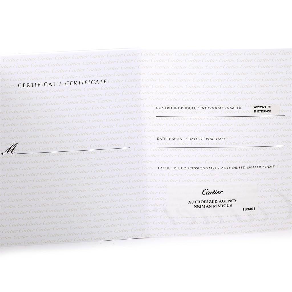 The image shows the warranty certificate for a Cartier Roadster W62027Z1 Men's Steel and Gold (two tone) Silver Dial W62027Z1 Men's Steel and Gold (two tone) Silver Dial model watch from an authorized agency, Neiman Marcus.
