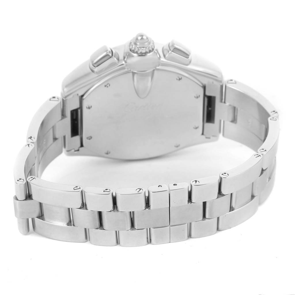The image shows the back case and metal bracelet of a Cartier Roadster W62006X6 Men's Stainless Steel Silver Dial W62006X6 Men's Stainless Steel Silver Dial watch at an oblique angle.