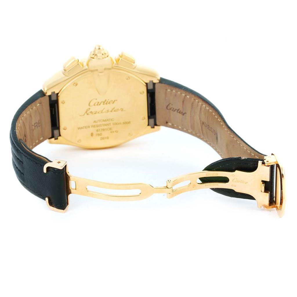 The image shows the back view of a Cartier Roadster W62021Y2 Men's Yellow Gold Silver Dial W62021Y2 Men's Yellow Gold Silver Dial watch, with its case back, leather strap, and deployment clasp visible.