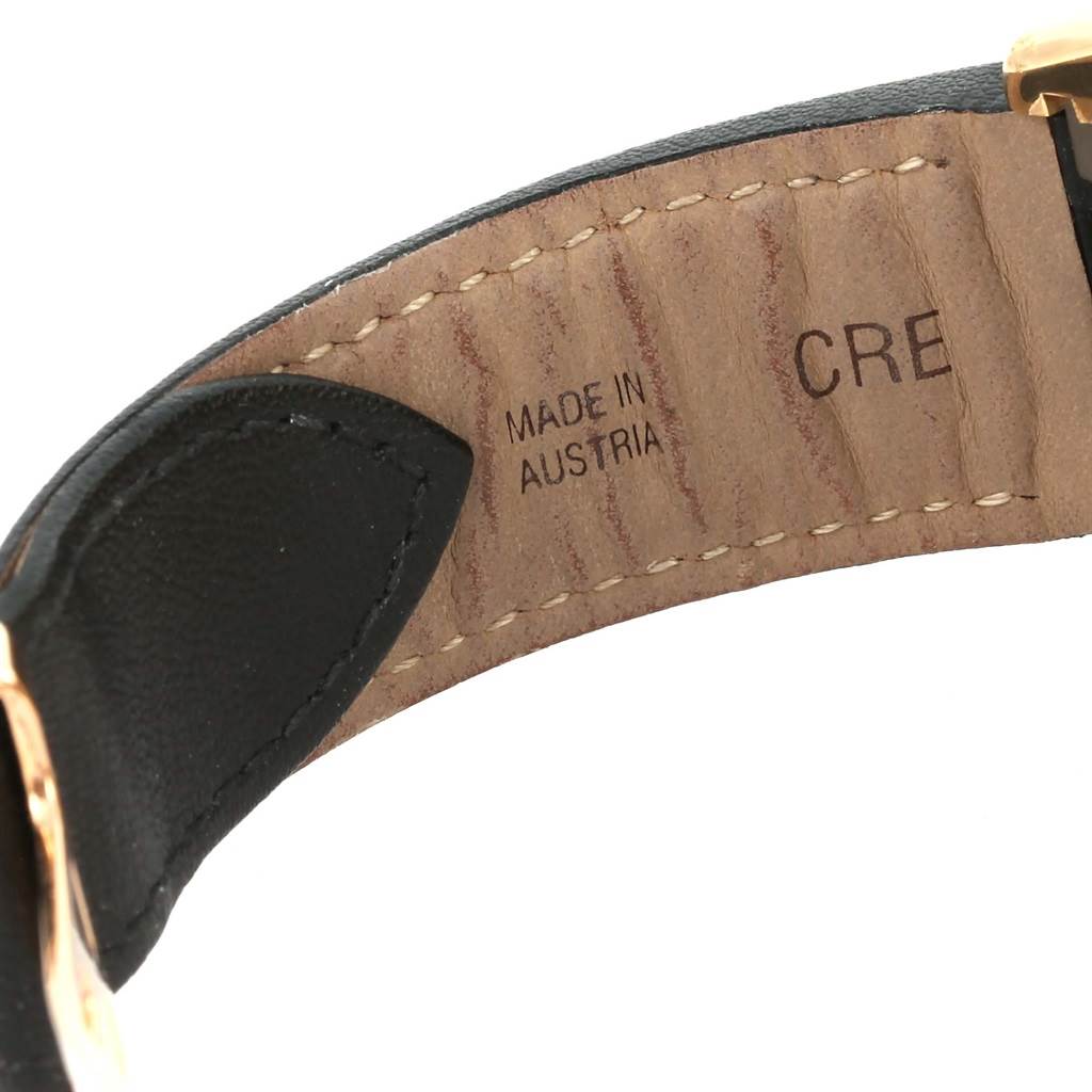 This image shows the inside of the leather strap for the Cartier Roadster W62021Y2 Men's Yellow Gold Silver Dial W62021Y2 Men's Yellow Gold Silver Dial watch, revealing stitching and the "Made in Austria" mark.