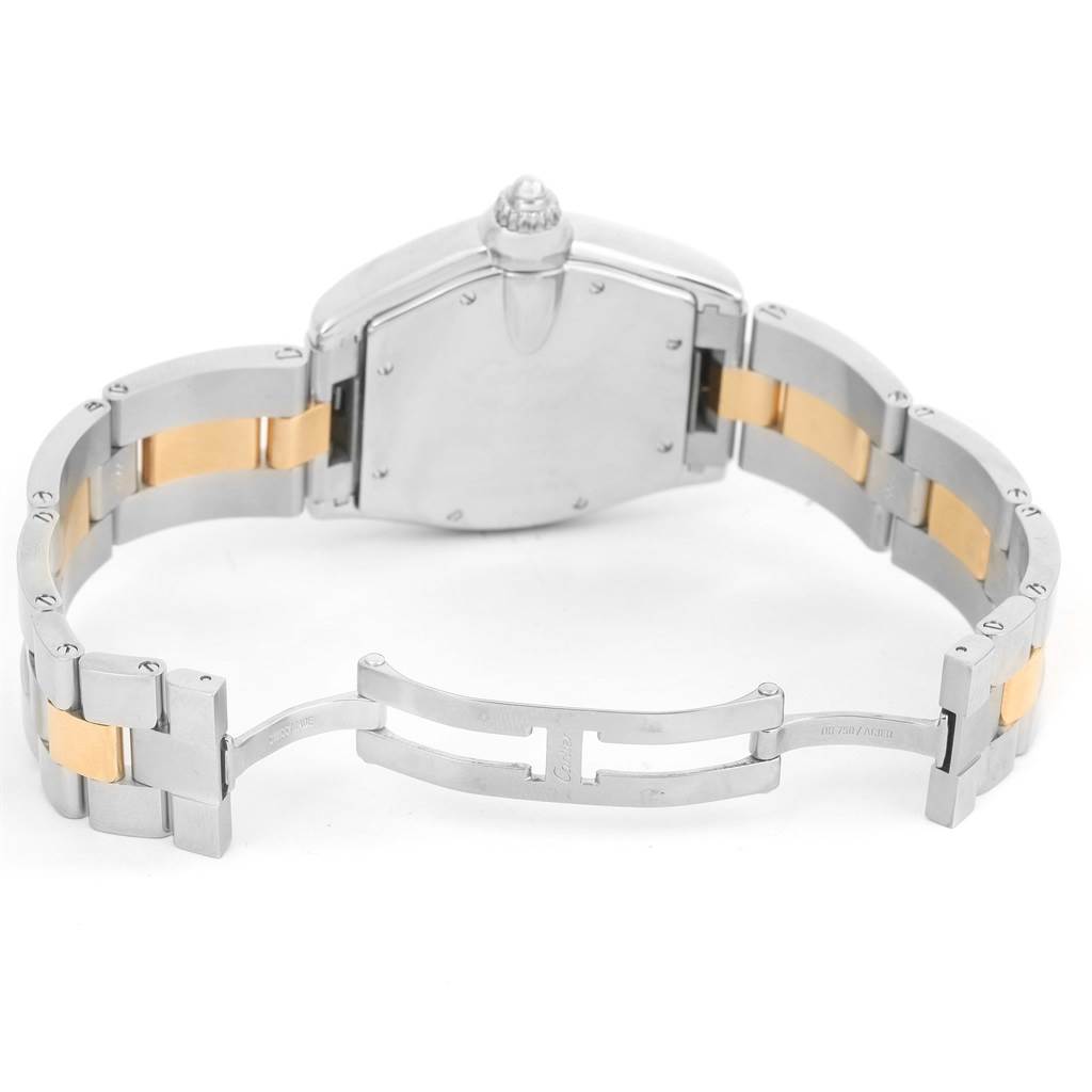 The Cartier Roadster W62031Y4 Men's Steel and Gold (two tone) Silver Dial W62031Y4 Men's Steel and Gold (two tone) Silver Dial watch is shown from the back, focusing on the case back and the two-tone stainless steel bracelet.