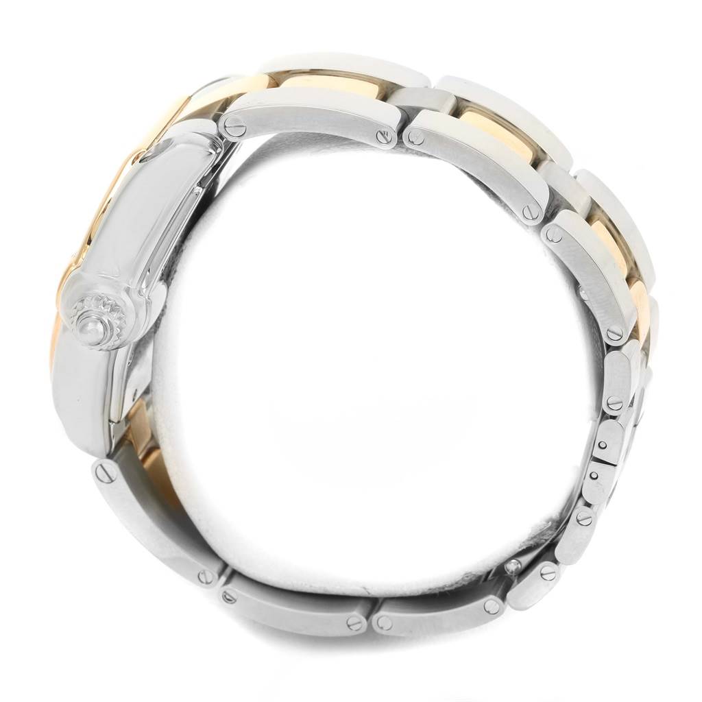 The image shows a side view of the Cartier Roadster W62031Y4 Men's Steel and Gold (two tone) Silver Dial W62031Y4 Men's Steel and Gold (two tone) Silver Dial watch, focusing on its bracelet links and crown.