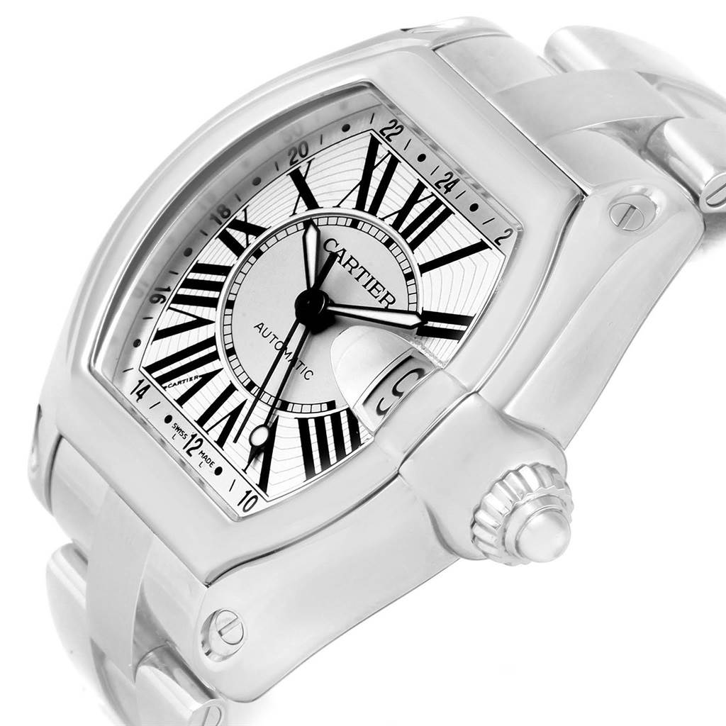 The image shows a close-up of the Cartier Roadster W62032X6 Men's Stainless Steel Silver Dial W62032X6 Men's Stainless Steel Silver Dial watch from a three-quarter angle, highlighting the dial, crown, and part of the bracelet.