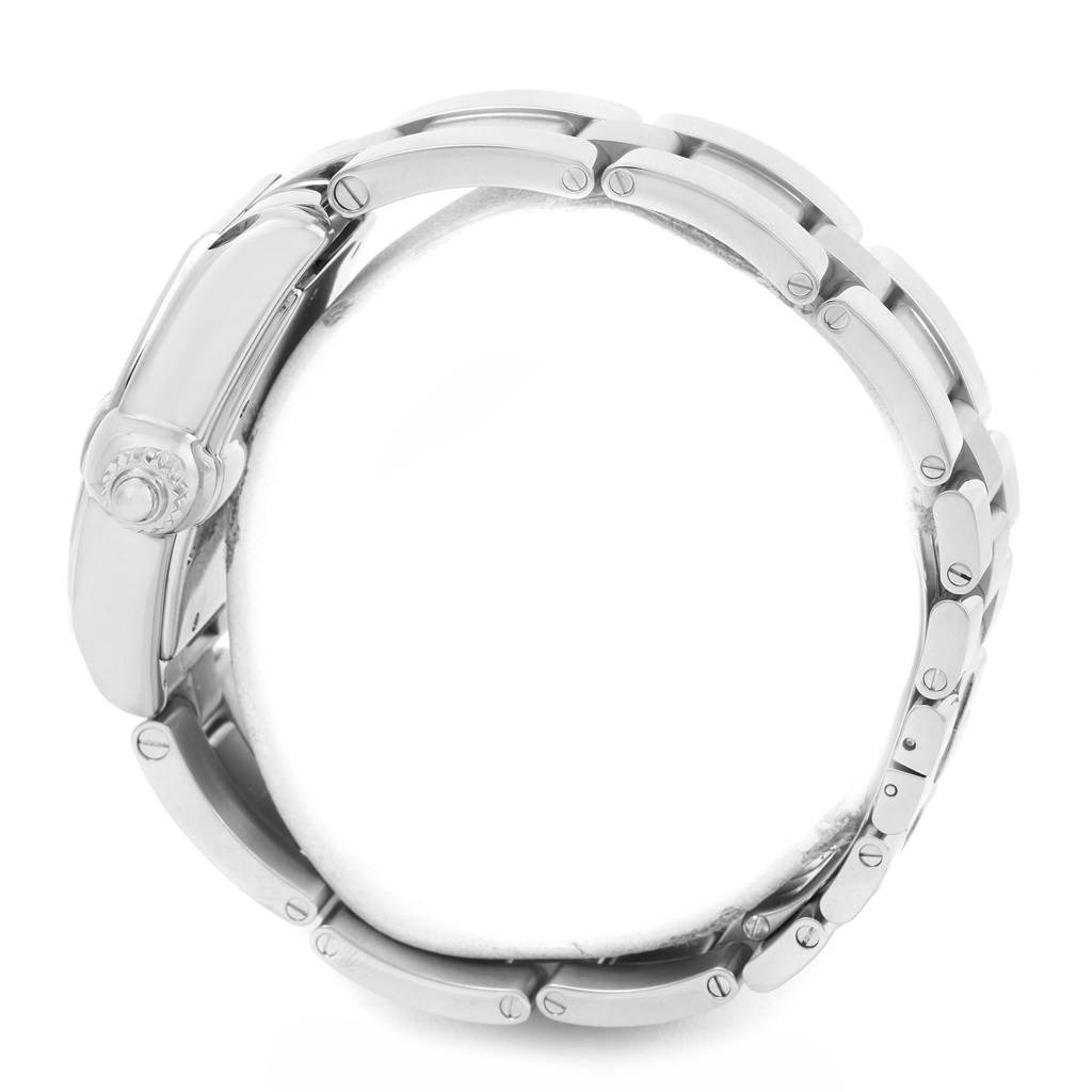 The image shows a side view of a Cartier Roadster W62048V3 Men
s Blue Dial W62048V3 Men
s Blue Dial watch, highlighting its crown and chain links.