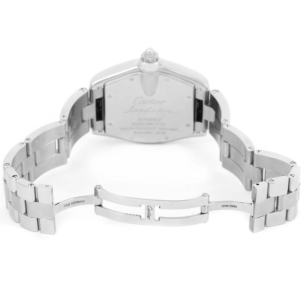 The image shows the back view of the Cartier Roadster W62048V3 Men
s Blue Dial W62048V3 Men
s Blue Dial watch, highlighting its stainless steel case and bracelet with the clasp open.